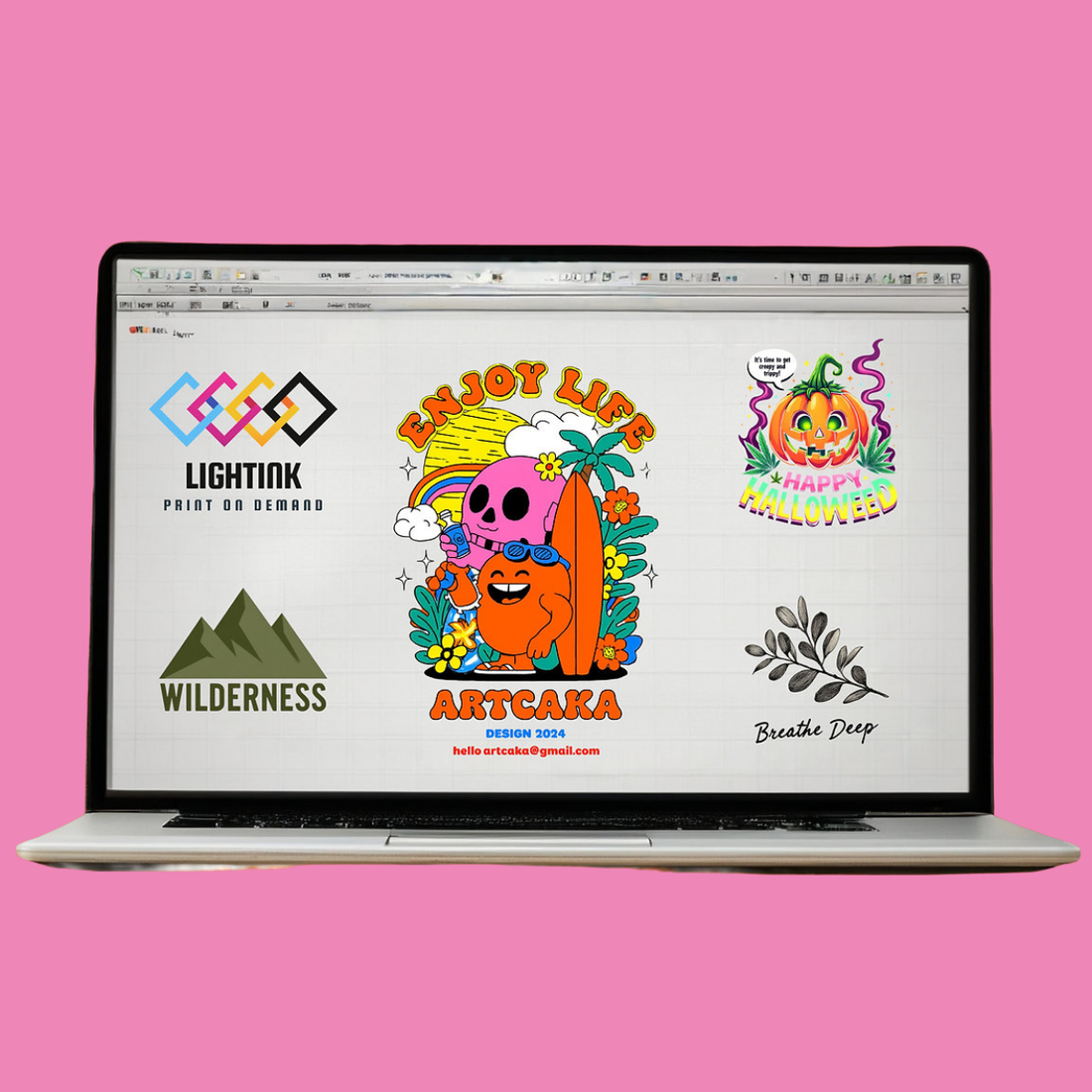 Laptop showing a DTF gang sheet with colorful cartoon designs and logos on screen